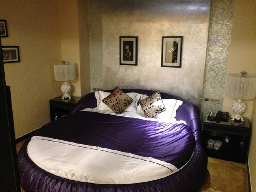 Tianguo Times Hotel ฝอซาน ห้อง รูปภาพ