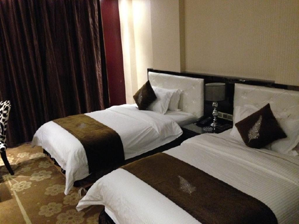 Tianguo Times Hotel ฝอซาน ห้อง รูปภาพ