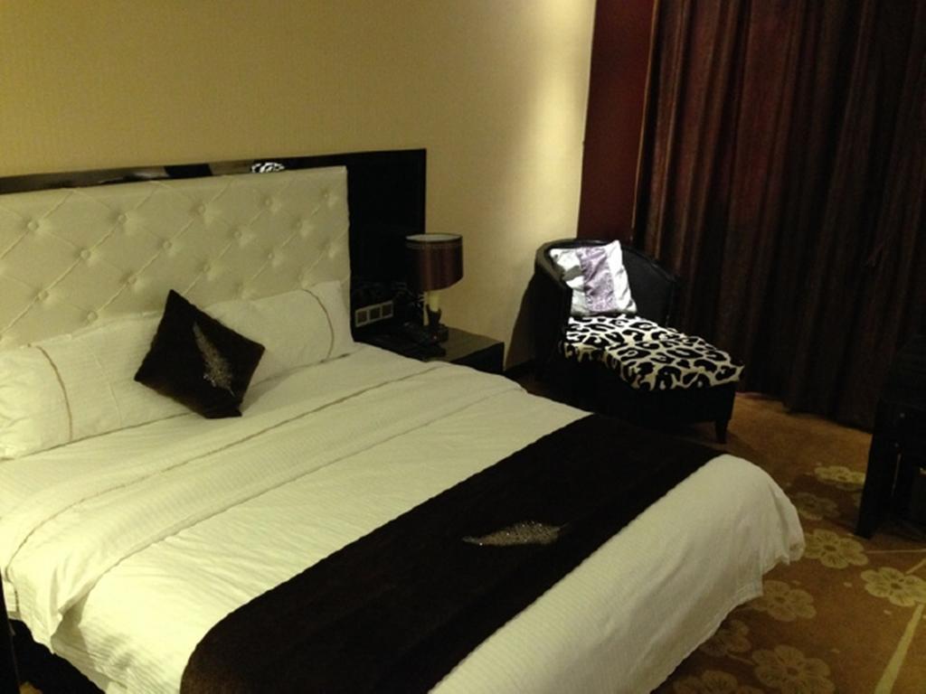 Tianguo Times Hotel ฝอซาน ห้อง รูปภาพ